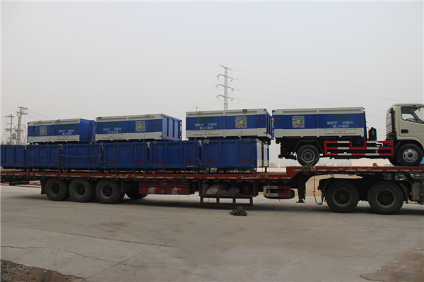 深圳环卫公司订购一台东风5方勾臂垃圾车10个定制版垃圾箱